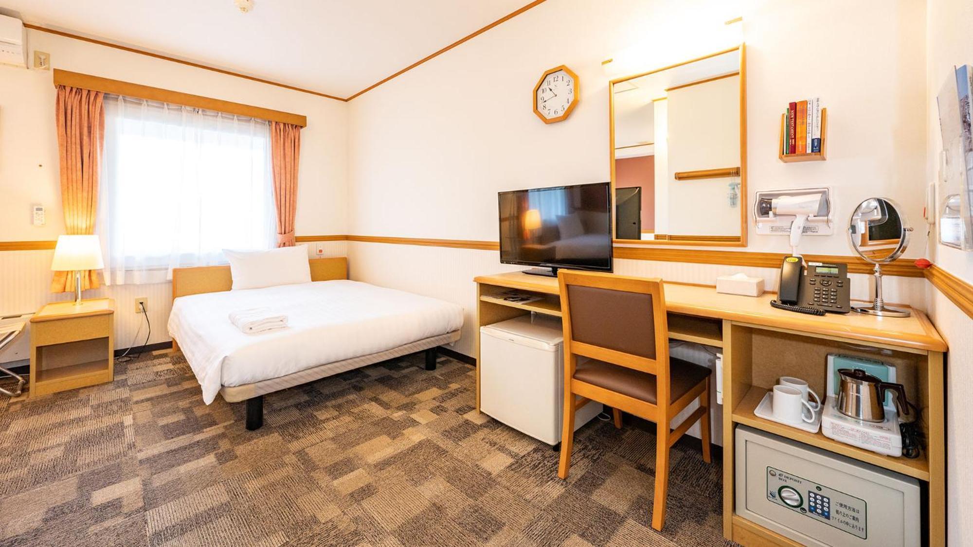 Toyoko Inn Nagoya Owari Ichinomiya Ekimae Zimmer foto
