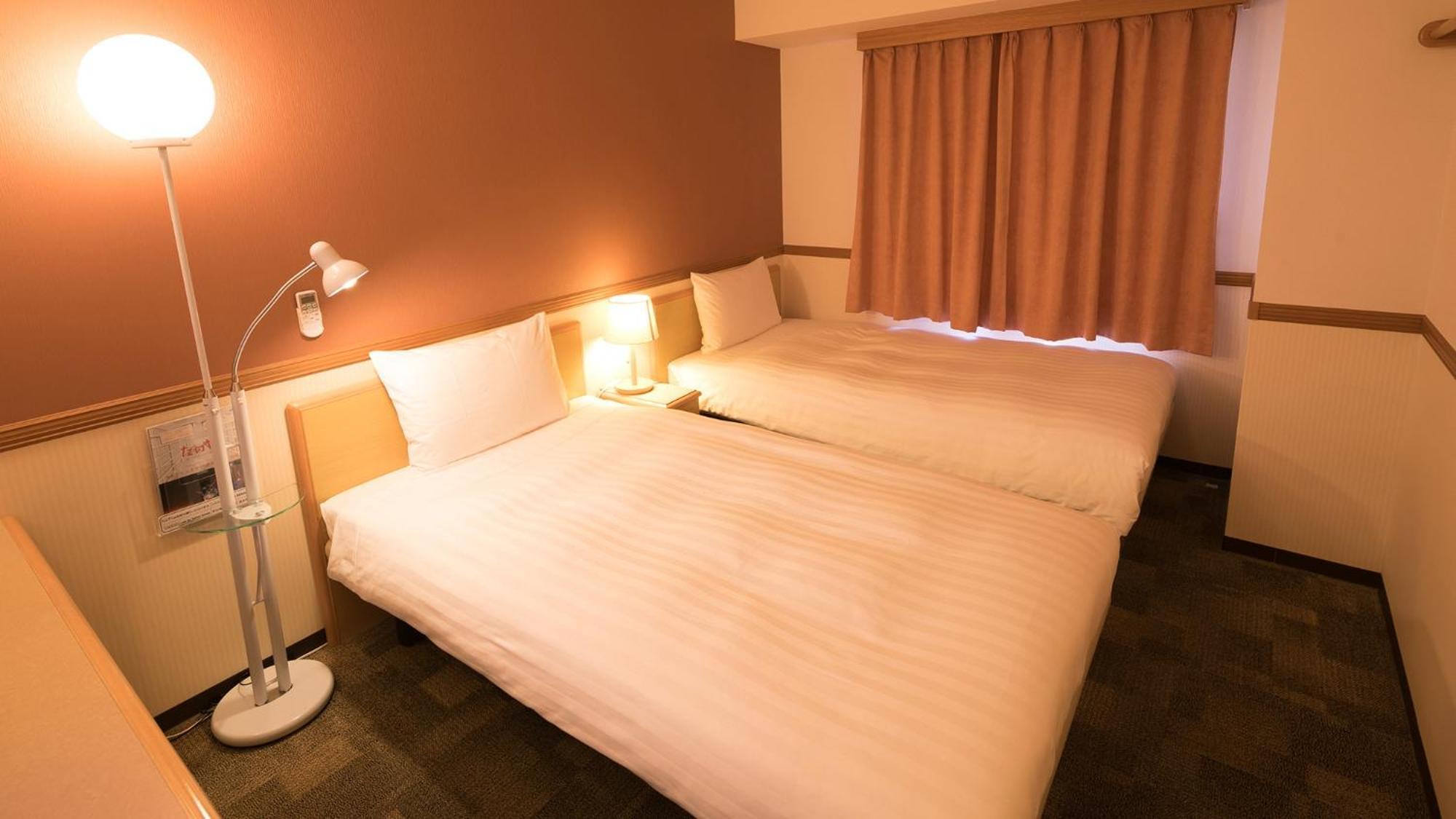 Toyoko Inn Nagoya Owari Ichinomiya Ekimae Zimmer foto